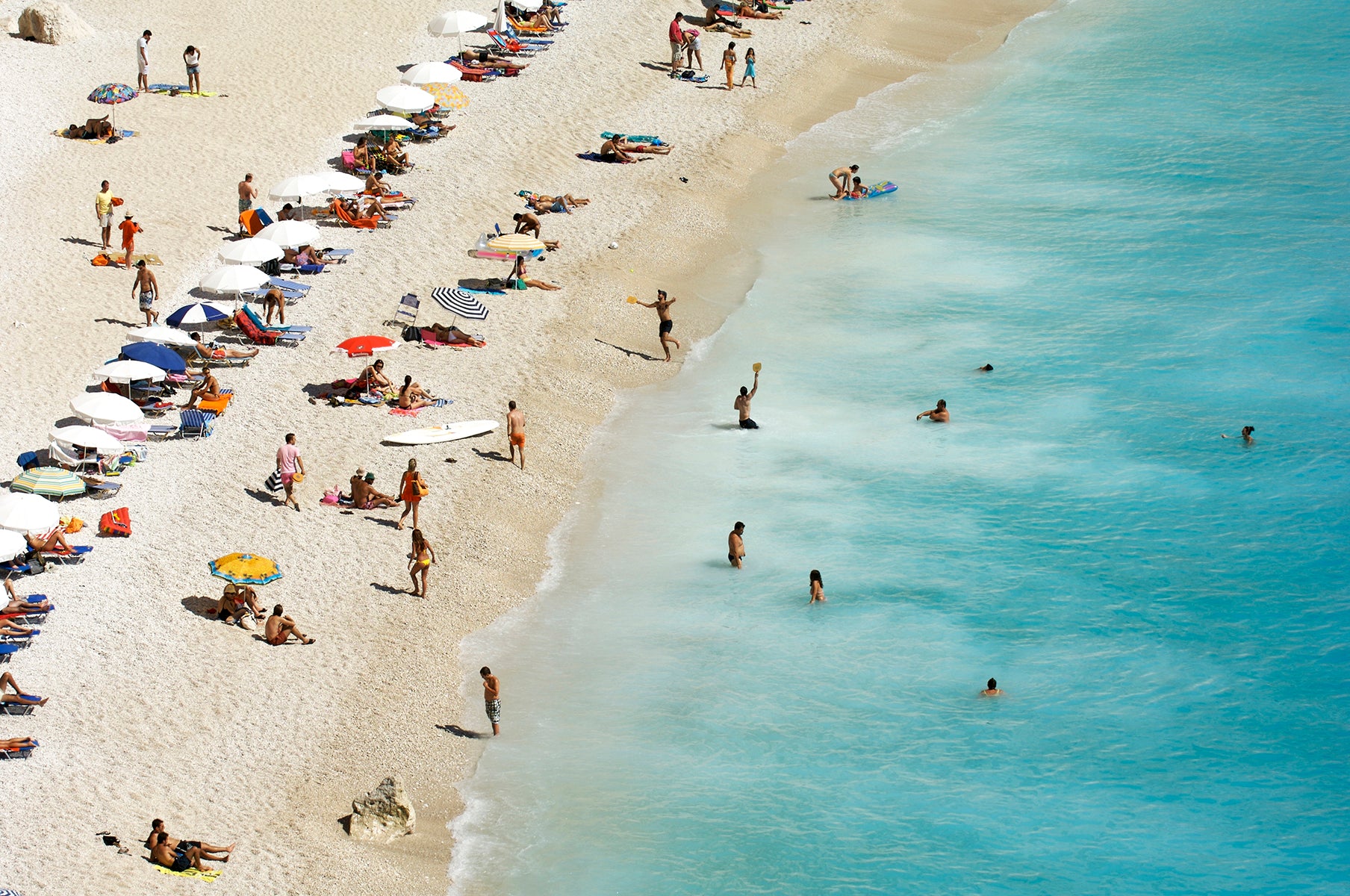 Sunbathing at beach, aerial view